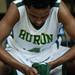 Huron junior Chris Mosley hangs his head after losing 66-58 to Ypsilanti on Friday, March 8. Daniel Brenner I AnnArbor.com